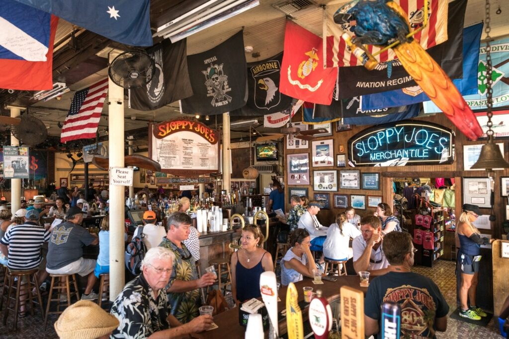 People hanging out inside Sloppy Joe's Bar in Key West, Florida