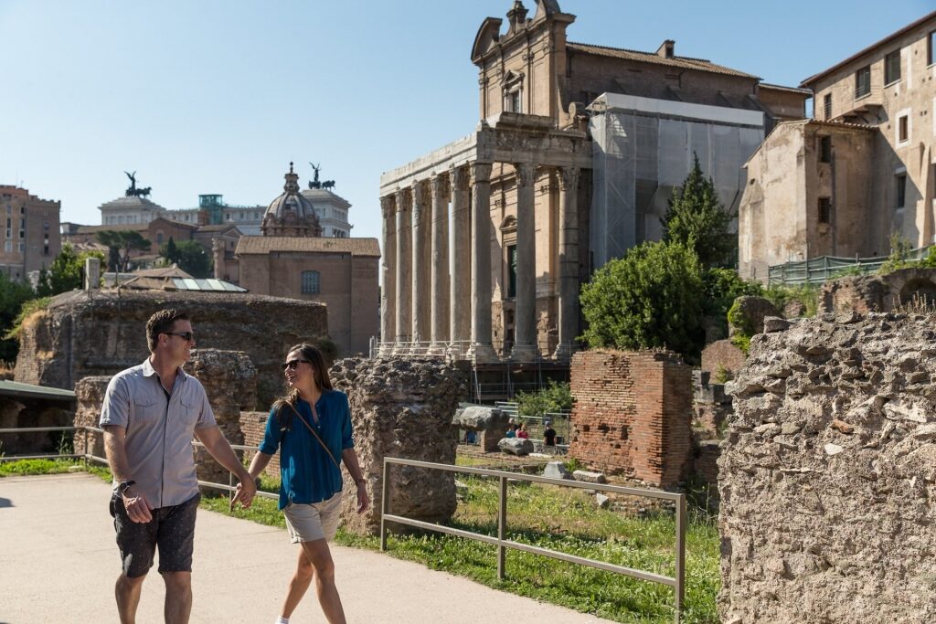 Couple walking along Roman Forum