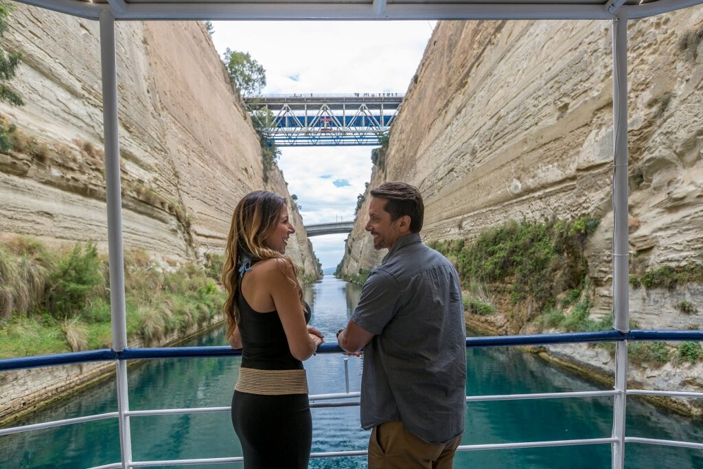 Couple on a boat through Corinth Canal