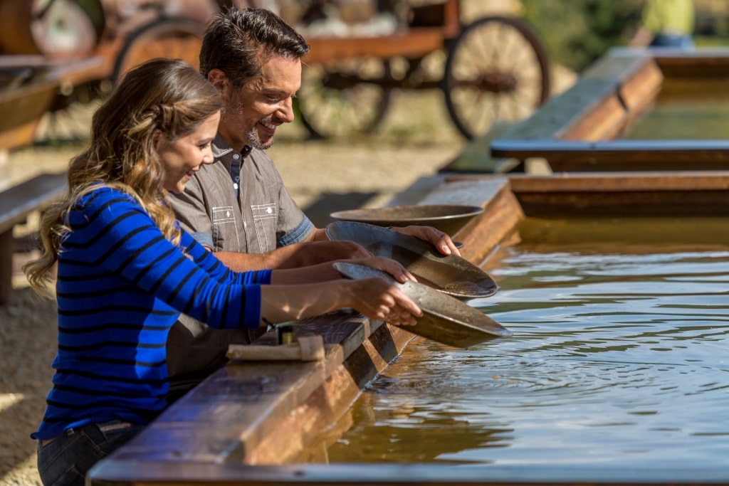 Couple gold panning in Alaska