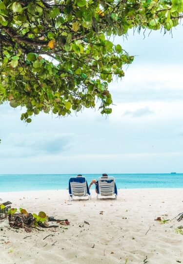 Couple chilling by the beach in Antigua