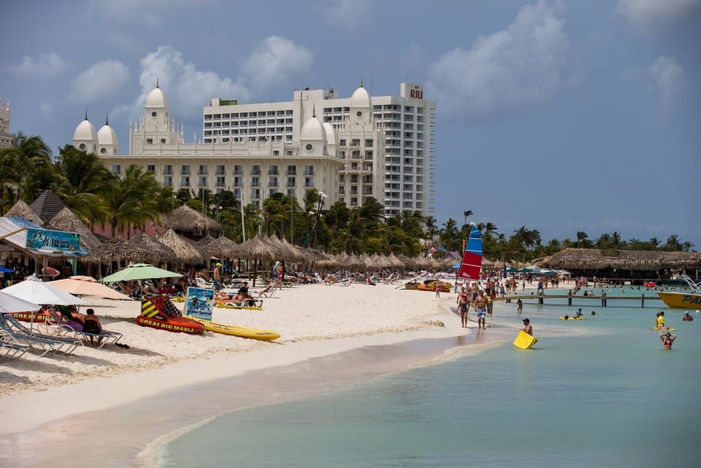 People hanging out at a beach in Aruba