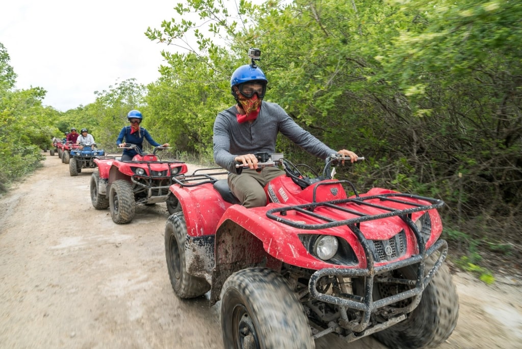 People on an ATV in Costa Maya