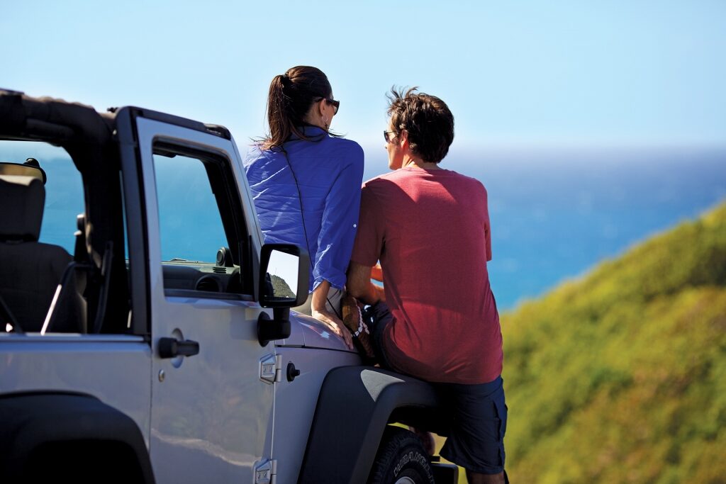 Couple on a jeep overlooking St Maarten