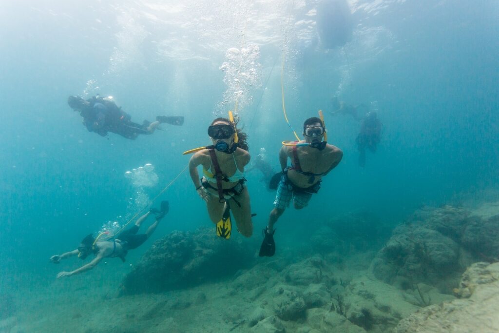 People scuba diving in St Maarten
