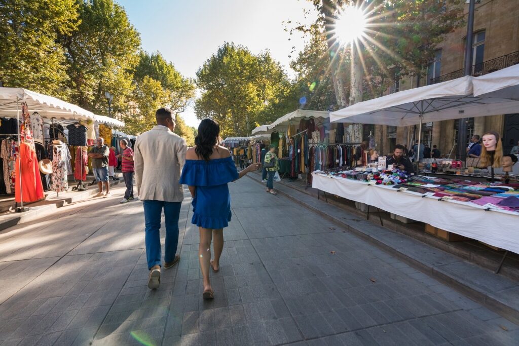 Couple walking along Cours Mirabeau, Provence