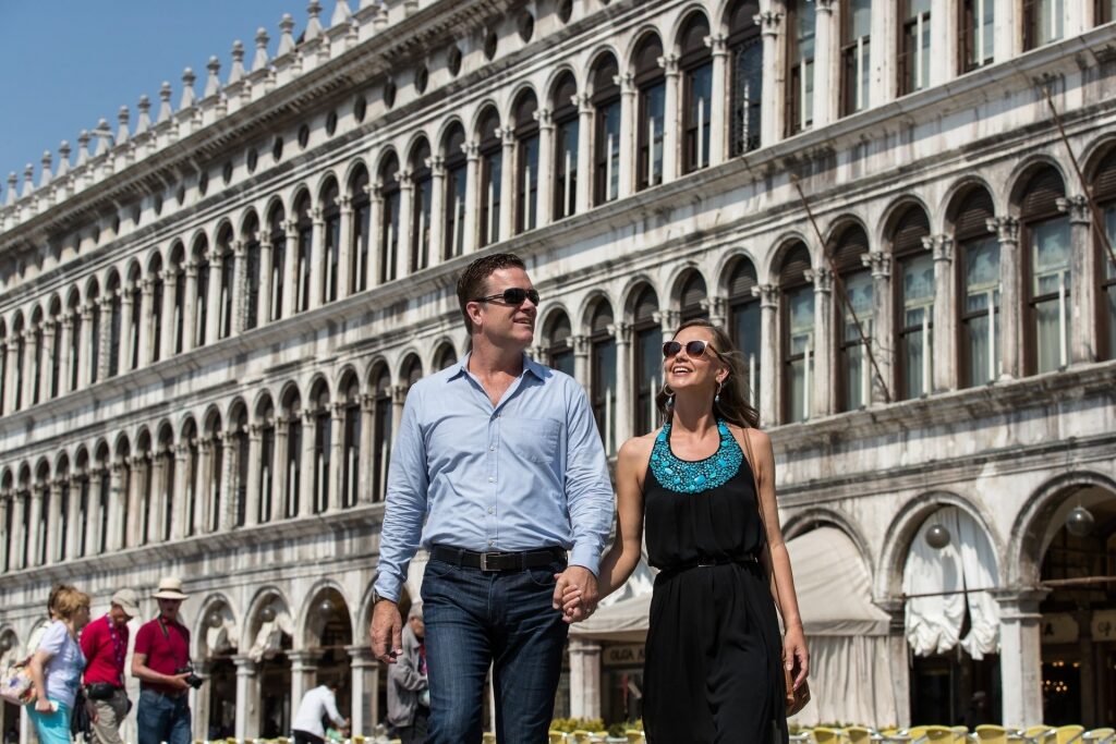 Couple strolling in Venice
