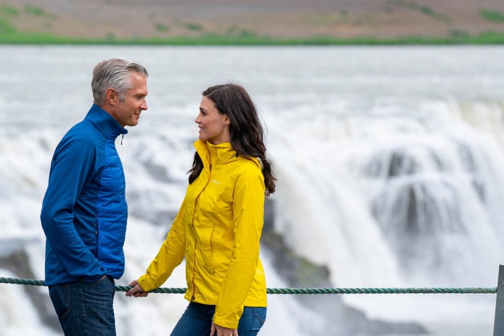 Couple wearing waterproof jacket