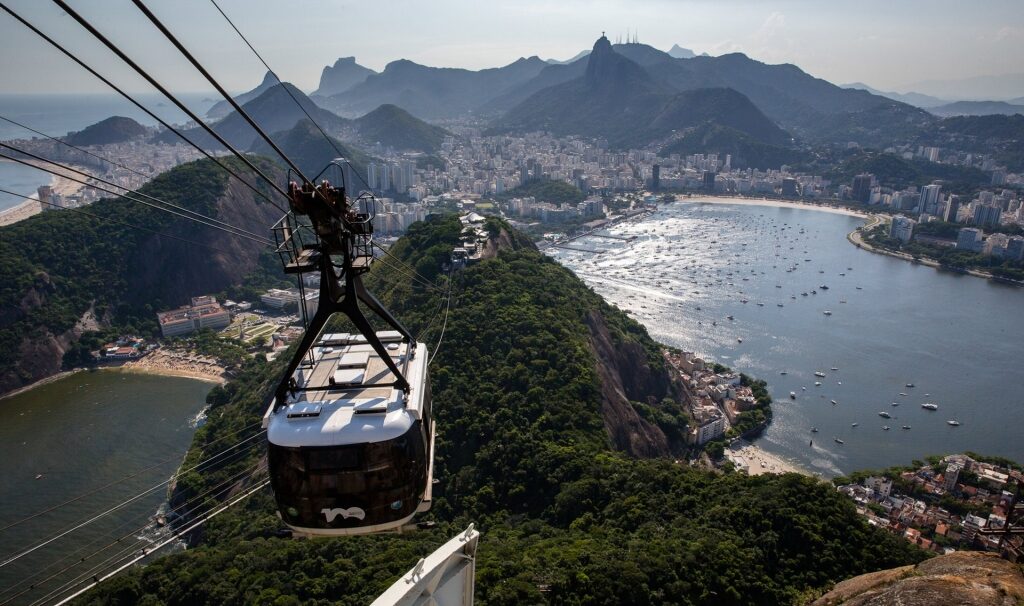 Cable car going down with picturesque Rio de Janeiro view