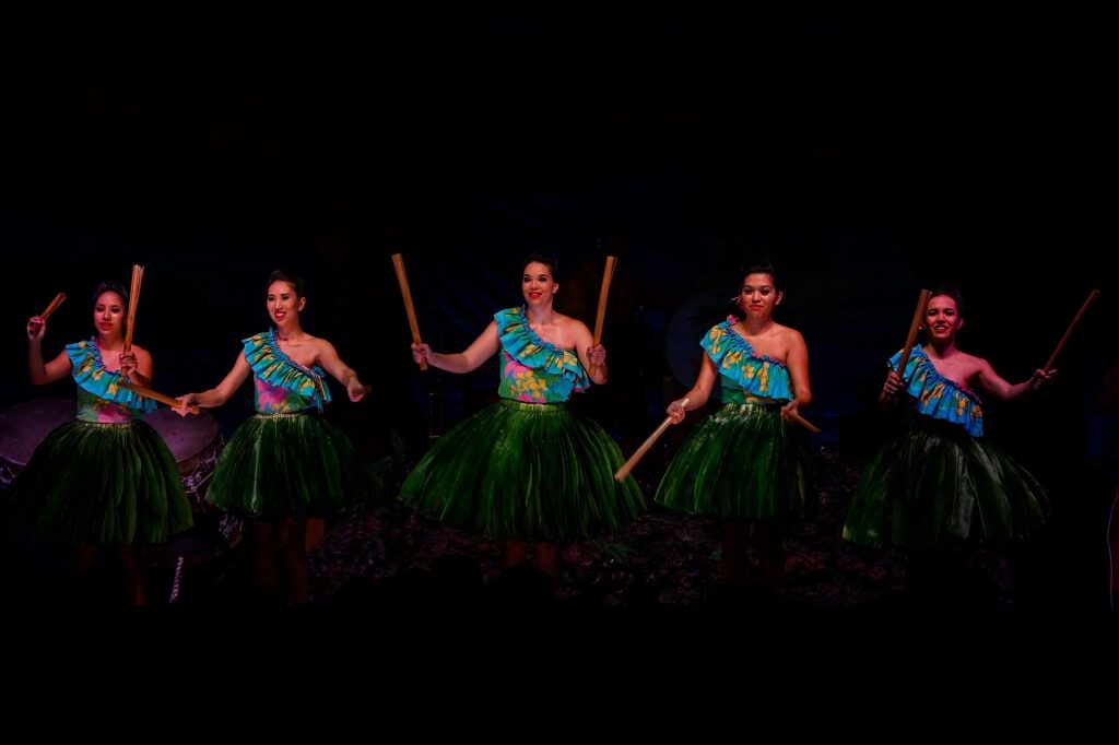 People performing traditional Hawaiian dance 