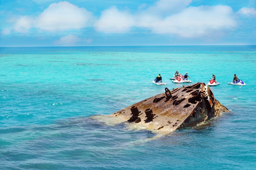 People approaching a shipwreck in Bermuda