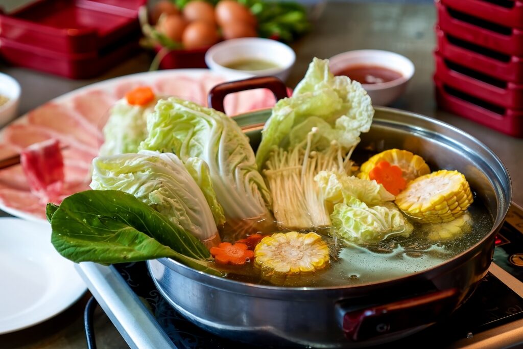 Shabu-shabu pot filled with veggies