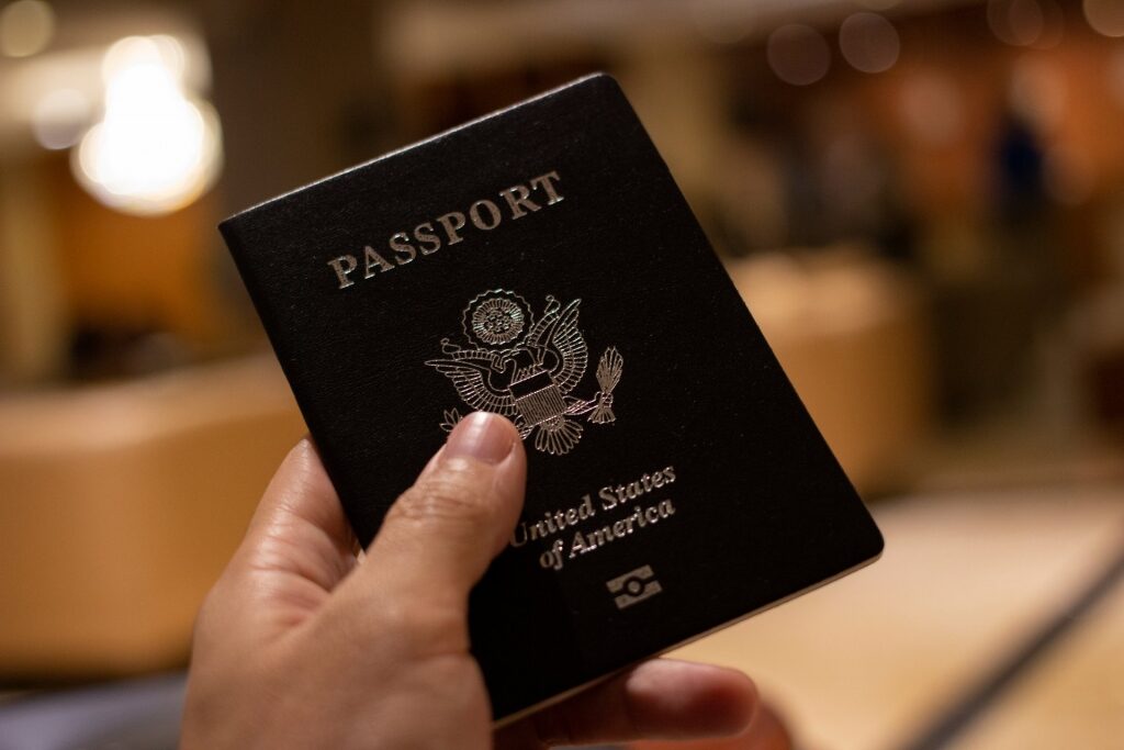 Man holding USA passport