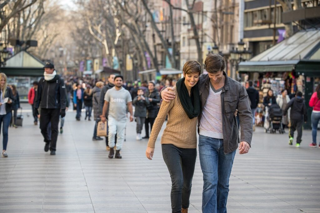 Couple walking the streets of Barcelona