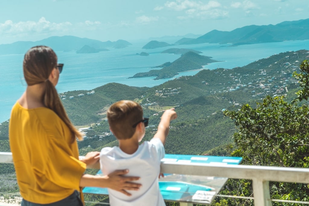 People at a viewing deck overlooking the island