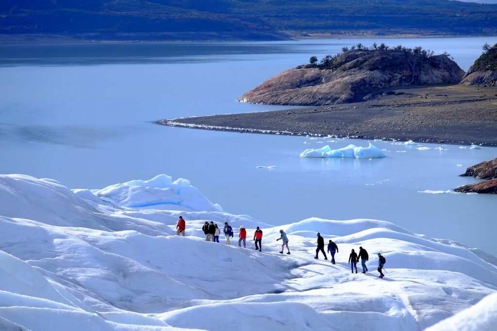 People walking on snow in Los Glaciares Natoinal Park