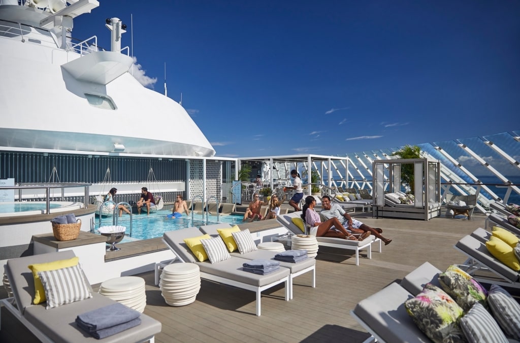 People relaxing on The Retreat Sundeck on Celebrity