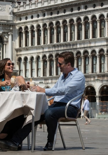 Couple dining al fresco in Venice