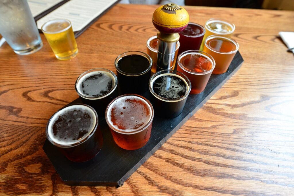 A serving of different cups of craft beer