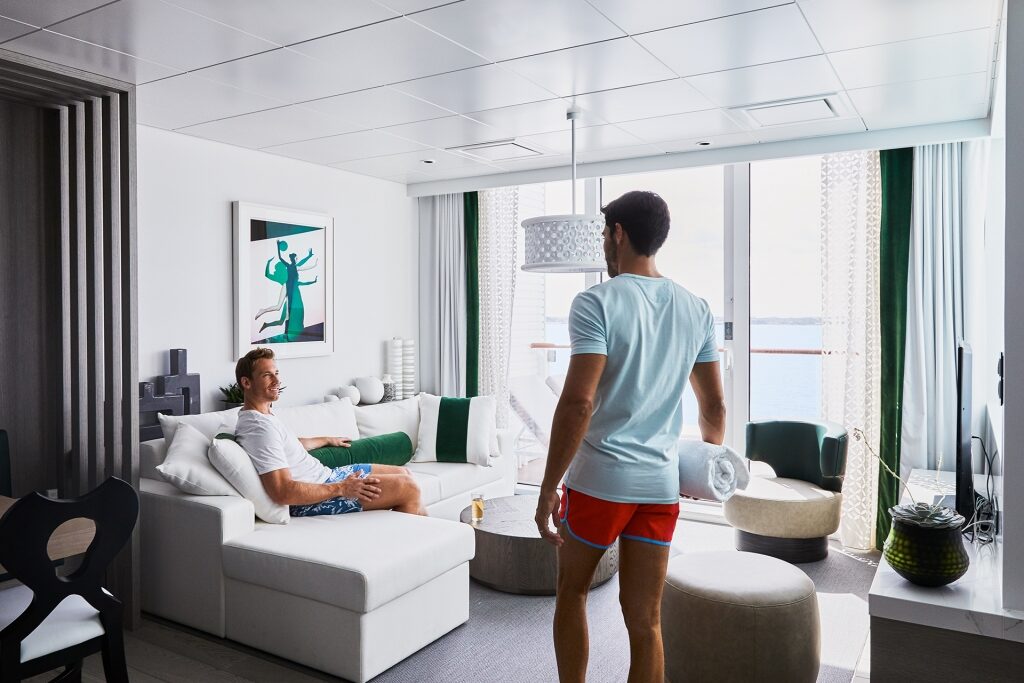 Couple hanging out inside stateroom