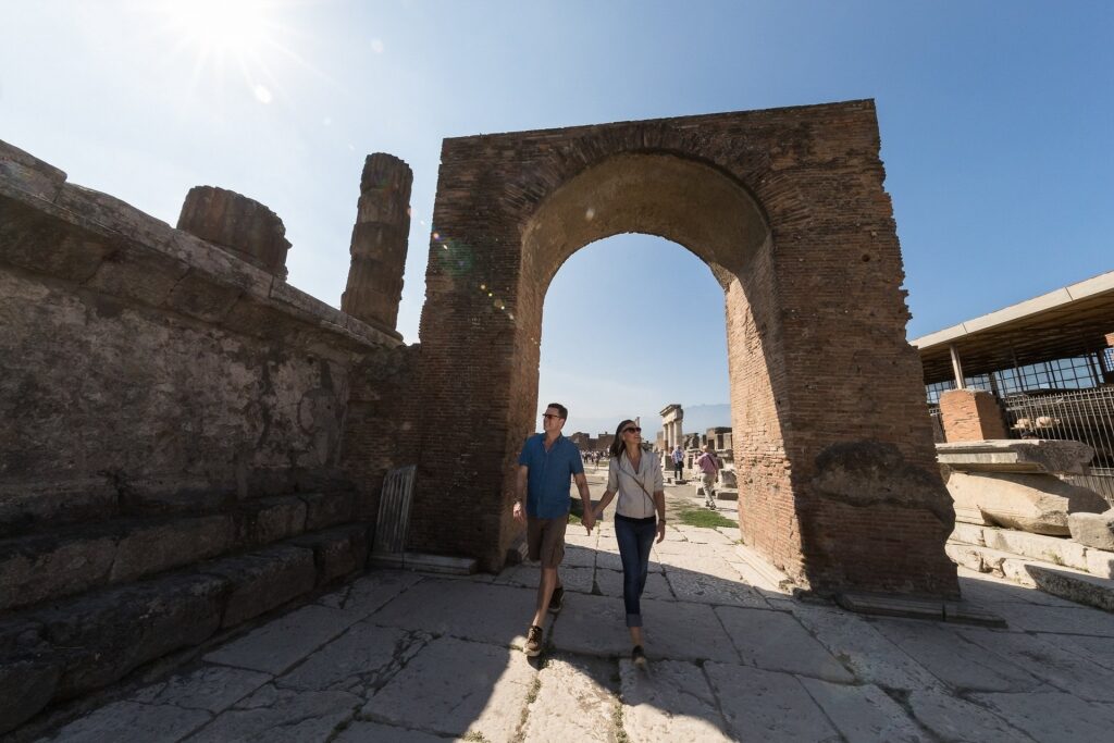 Couple walking around Pompeii