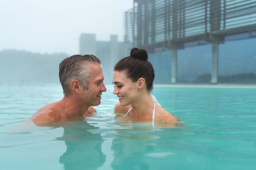 Couple relaxing in Blue Lagoon Iceland