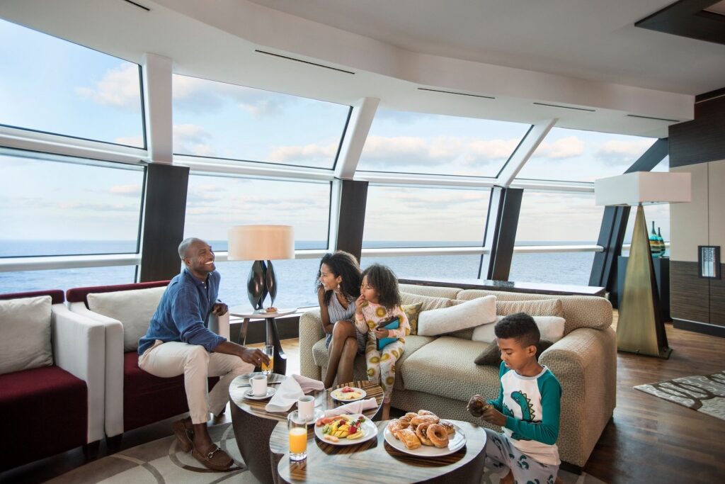 Family enjoying a luxury cruise suite