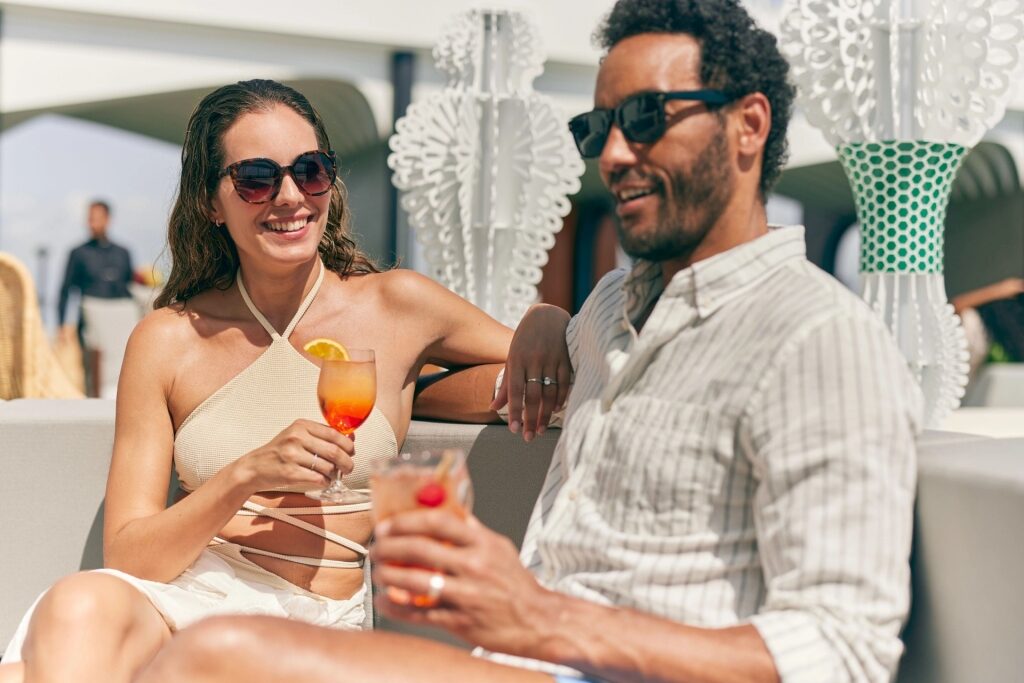 Couple enjoying a cocktail aboard Celebrity Cruises