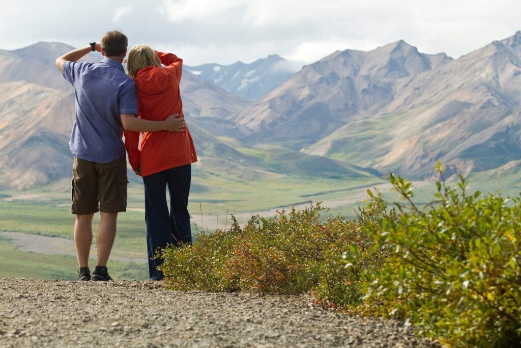 Couple looking at the mountains in Alaska