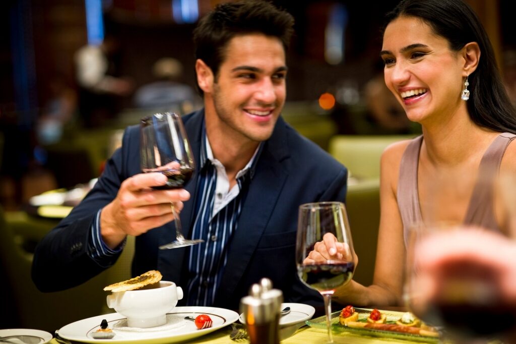 Couple wearing evening chic clothes for dinner