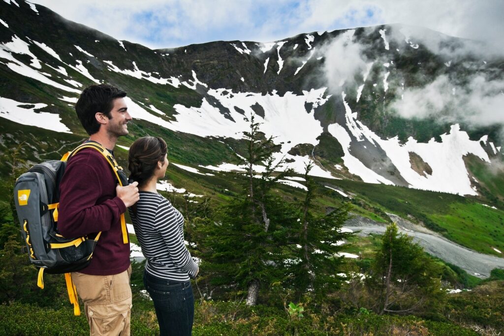 Couple wearing long sleeved shirts in Alaska