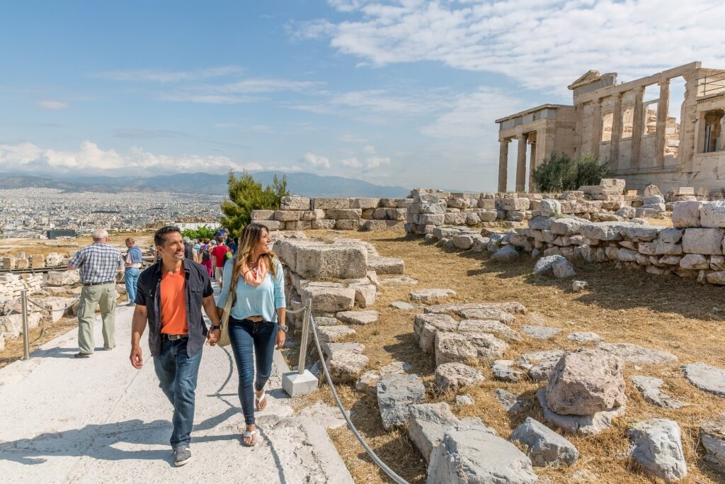 Couple exploring the Parthenon in Athens, Greece