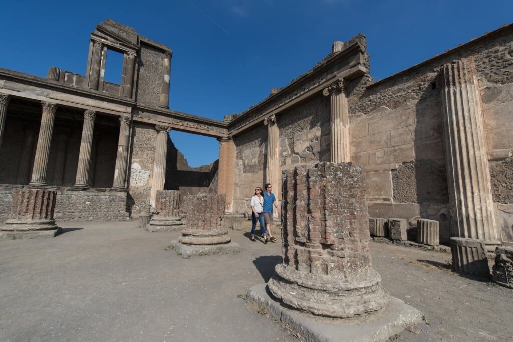 Couple exploring Pompeii, Italy
