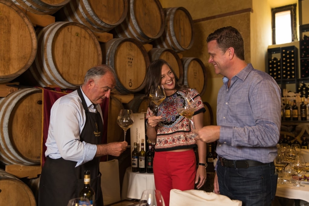 Couple on a wine tasting in Tuscany