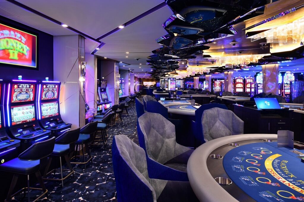 Purple themed interior of the casino on Celebrity Cruises