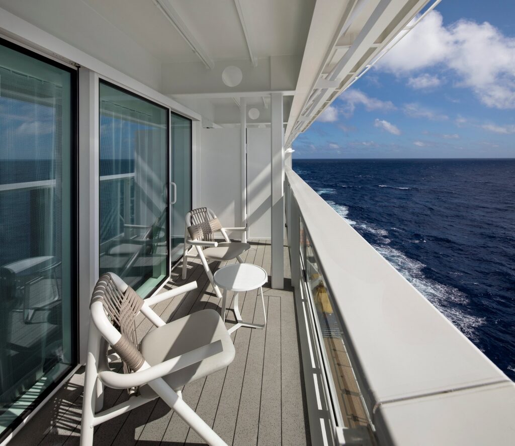 Celebrity Edge Stateroom Balcony with chairs to sit for sightseeing