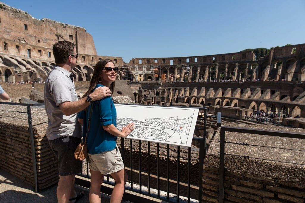 Couple inside the walls of Colosseum
