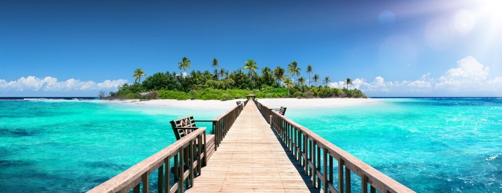 Boardwalk leading to island in Bahamas with scenic view of the ocean 