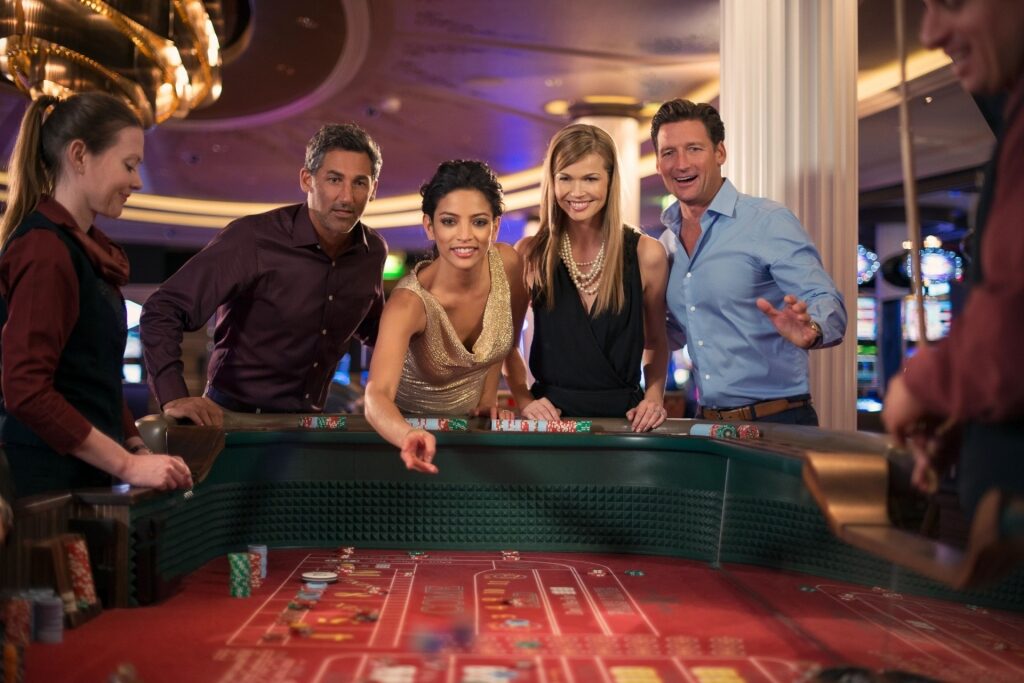 People playing at the Casino of Celebrity Cruises