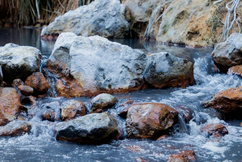 Water flowing on rocks in Sulphur Springs, St. Lucia 