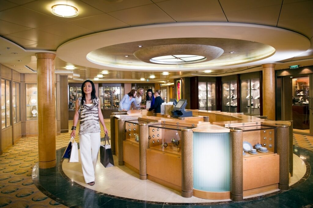 Guest shopping onboard Celebrity Cruises