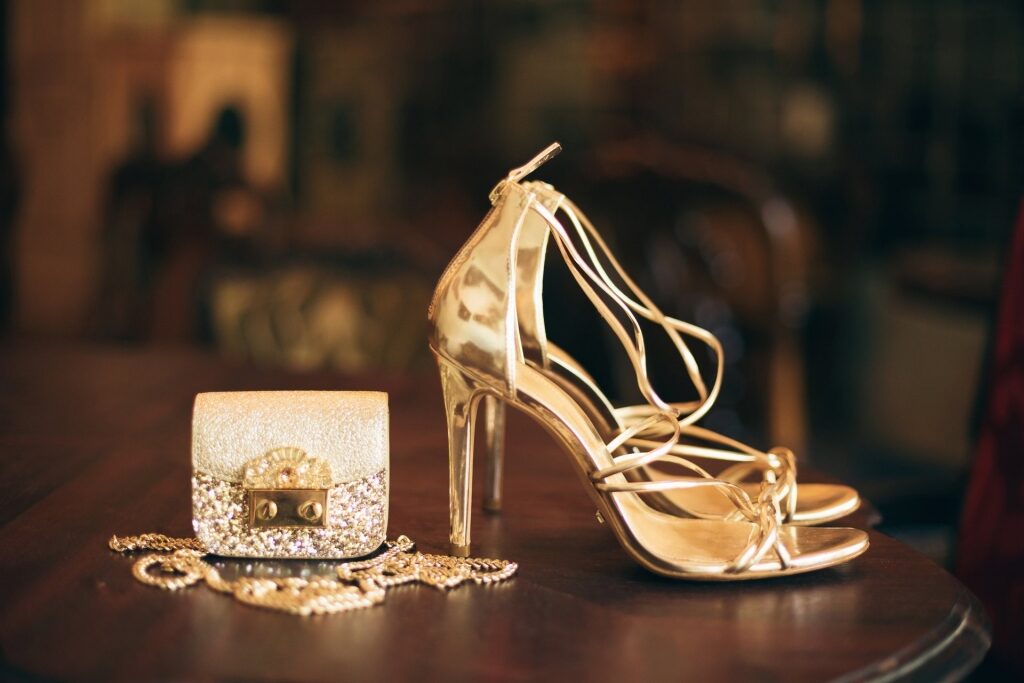 Gold high heels and small bag 