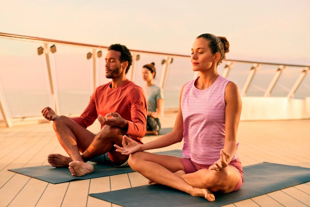 People doing yoga on a cruise