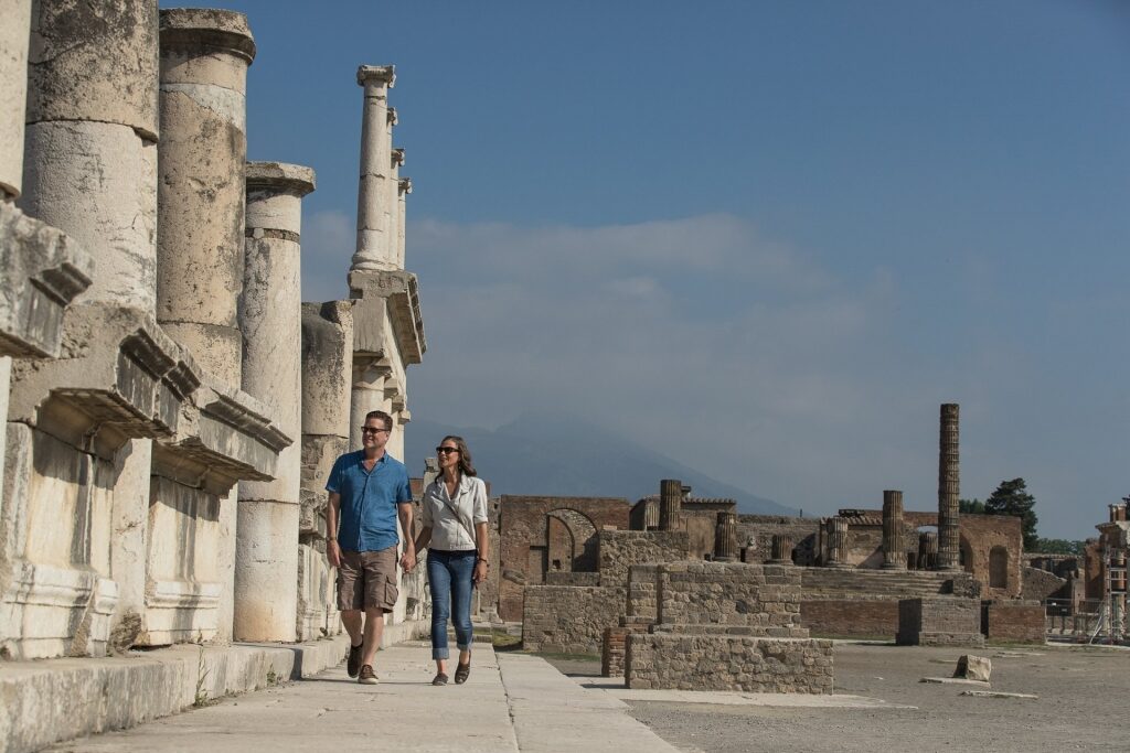Couple walking in Pompeii
