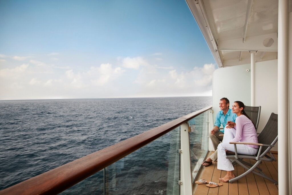Couple sitting on a cruise balcony