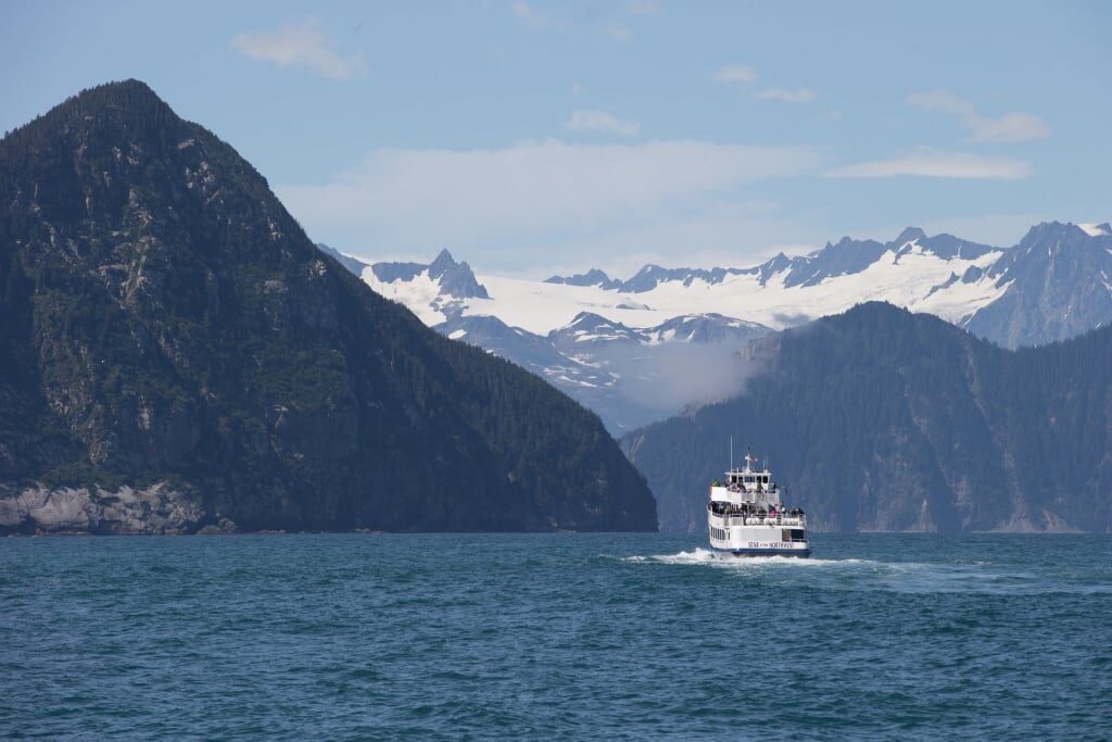 Cruise ship sailing along Alaska fjords