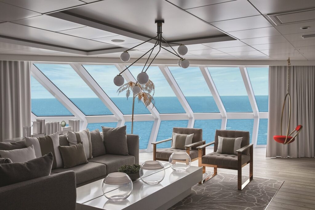Celebrity Edge suite with huge glass window overlooking the ocean