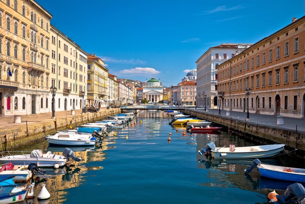 View of grand canal with buildings in Trieste, Italy