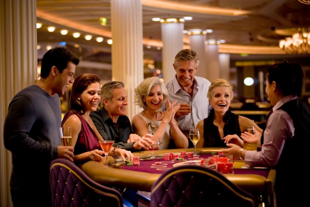 People playing casino with drinks