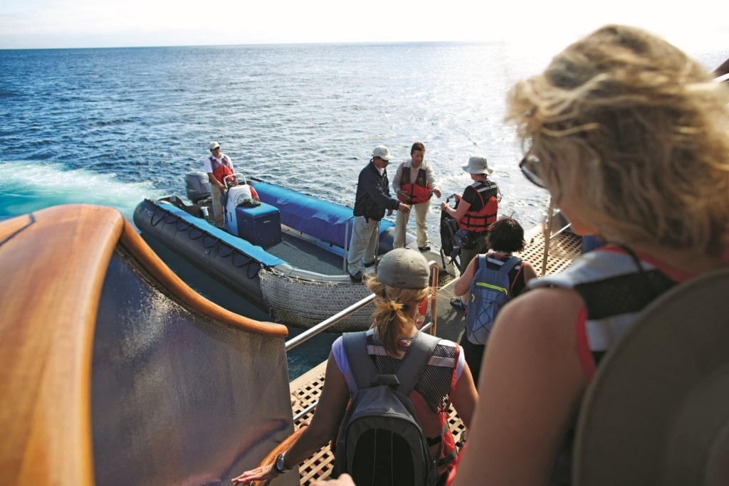 People walking to the boat for an excursion